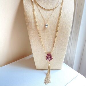 Long three layer chain necklace in goldtone with pendants tassel and rhinestone